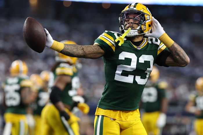 Green Bay Packers cornerback Jaire Alexander (23) reacts after an interception against the Dallas Cowboys in the first half of the 2024 NFC wild card game at AT&T Stadium.